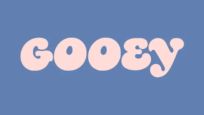 GOOEY Regular actual-font specimen, soft pink letters on muted blue.
