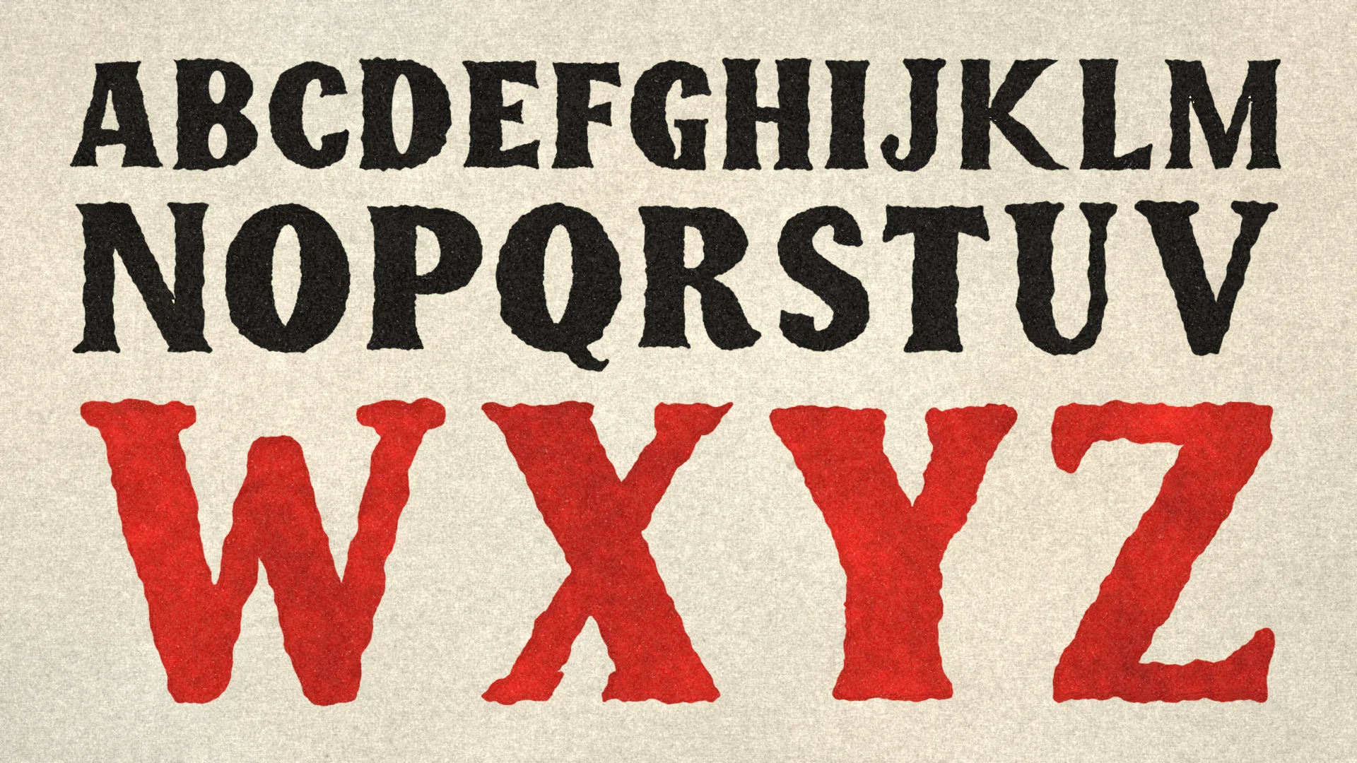 Uppercase A to Z in three rows that grow larger, the last row W X Y Z in red.
