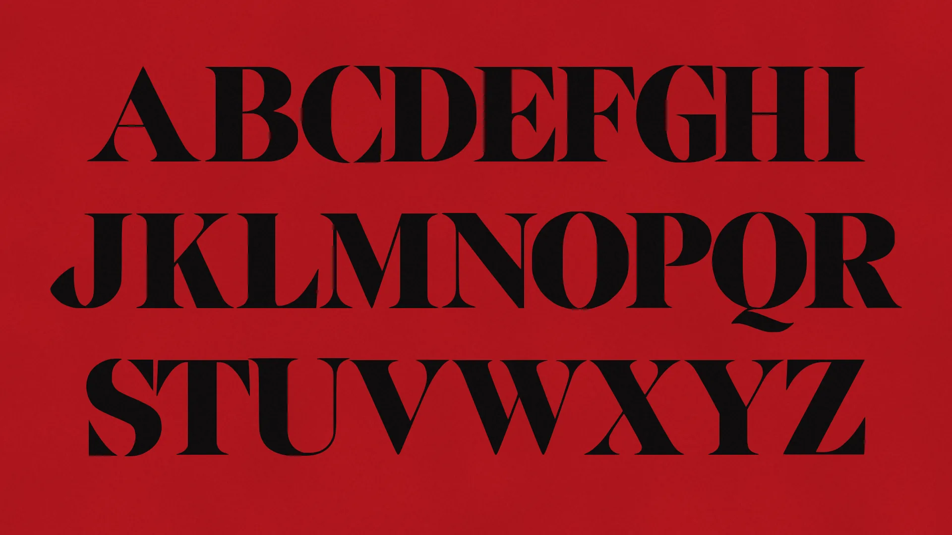 Uppercase A to Z of VALCREST in three rows of black high-contrast serif capitals on red.