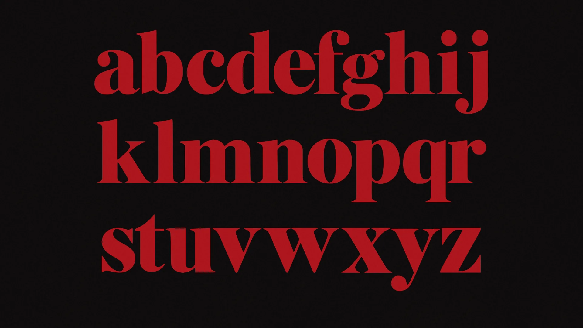 Lowercase a to z of VALCREST in three rows of red letters on black.