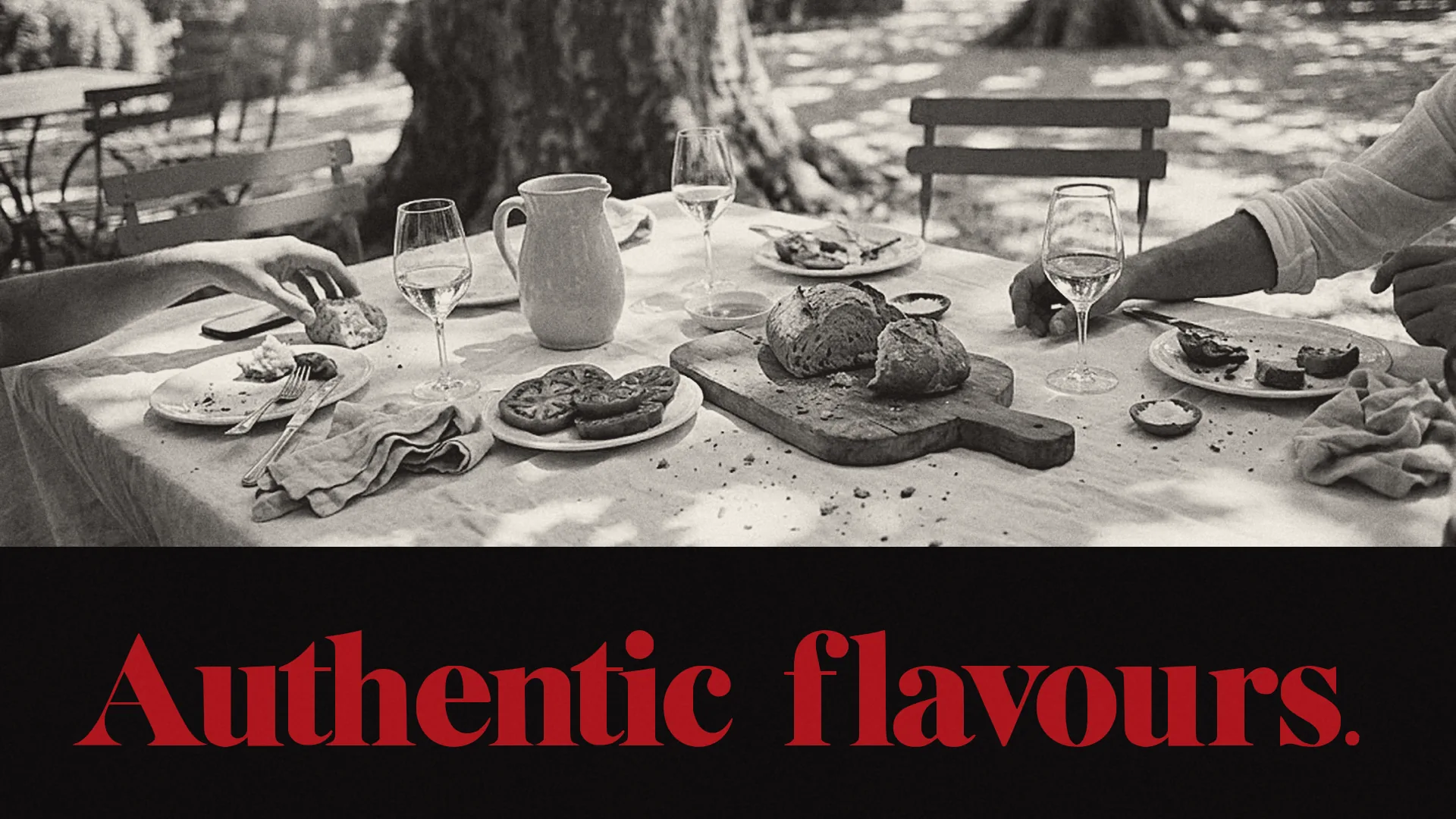 A black-and-white photograph of a summer lunch under plane trees above the words Authentic flavours. in red on black.